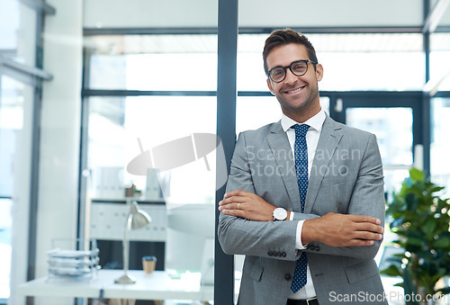 Image of I started, builded and run this successful company. Portrait of a well-dressed businessman standing in his office.