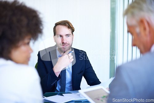 Image of Business discussions. a group of business colleagues meeting in the boardroom.