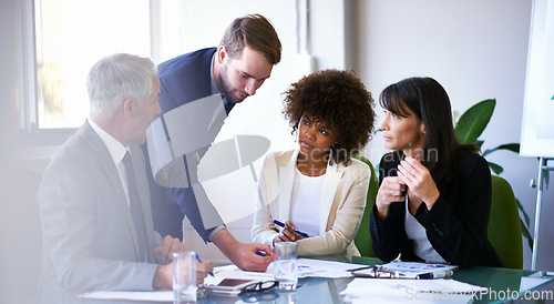 Image of Getting the job done with teamwork. a group of business colleagues meeting in the boardroom.