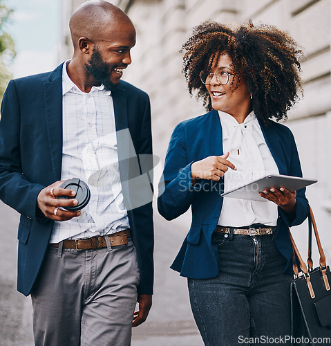 Image of Im really impressed with how you handled that meeting. two businesspeople having a discussion while walking through the city together.