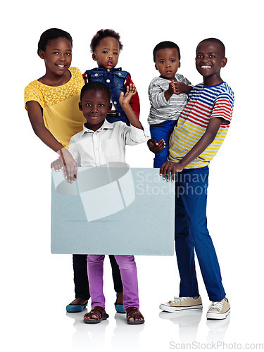 Image of Weve got a message for the future. Studio shot of african children holding a blank board against a white background.