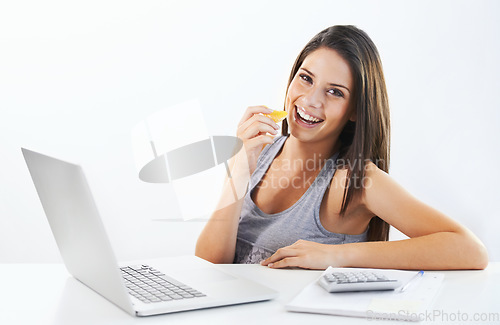 Image of Laptop, portrait and woman nutritionist with orange in studio for wellness, diet or eating plan on white background. Weight loss, face or lady health influencer with blog survey, help or menu guide