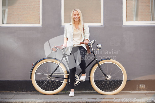 Image of Travel, portrait and woman with a bicycle in a city street for vacation, trip or weekend freedom. Adventure, cycling and female person with a bike outdoor for eco transport, fun and exploring London