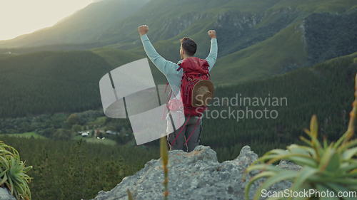 Image of Man, celebration and mountains for hiking achievement, nature or view for trekking goal on vacation. Hiker guy, back and fist for winner, hill and fitness with exercise, success or cliff in Argentina