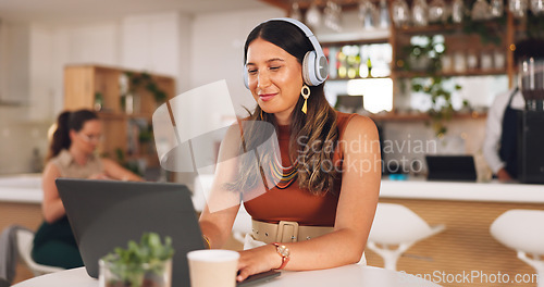 Image of Laptop, freelance and woman in coffee shop with headphones, online research career and smile. Communication, technology and remote work, happy girl in cafe at computer, virtual assistant and internet
