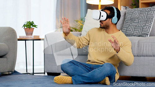 Image of Home, virtual reality glasses and man on the floor, metaverse and online game with fun in a living room. Person, futuristic or player with esports, tech or VR eyewear with headphones or stress relief