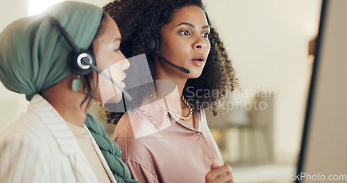 Image of Call center women, computer and together for coaching with error, glitch and thinking for problem solving. CRM teamwork, ideas and solution for customer service, telemarketing or tech support at job