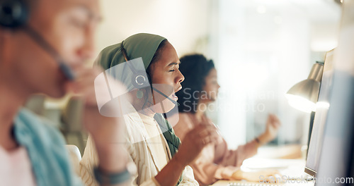 Image of Call center woman, yawn and tired at computer, office or fatigue with team, customer service pr telemarketing. Muslim crm, burnout and overtime with tech support, help desk or consulting in workplace