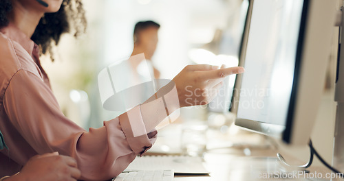 Image of Pointing, computer or hand of woman in call center speaking, communication or talking on mic. Customer services closeup, blurry screen or virtual assistant in conversation in technical support office