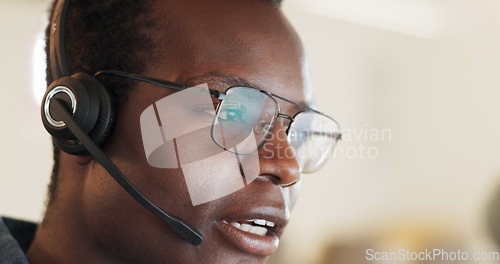 Image of Call center, consulting and advice with face of black man in office for contact us, communication or customer service. Salesman, help desk and technical support with person in crm agency for advisory