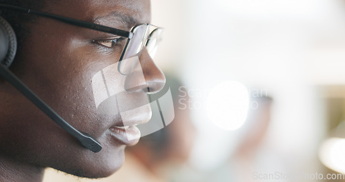 Image of Call center, consulting and telemarketing with black man in office for contact us, communication and customer service. Salesman, help desk and technical support with person in agency for mockup space