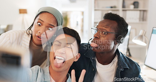 Image of Call center employees, funny selfie and office with tongue, peace sign and happy together for post on web blog. Telemarketing staff, agent or consultant group with comic memory for social network