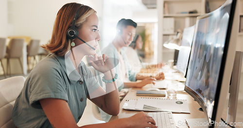 Image of Call center, consulting and thinking with black man in office for contact us, communication and customer support. Salesman, help desk and technical support with person in crm agency for telemarketing