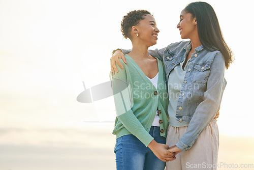 Image of Love, beach and mockup, lesbian couple hug and holding hands together on sunset holiday adventure. Lgbt women, bonding and relax on ocean vacation with romantic date, pride and happy nature travel.