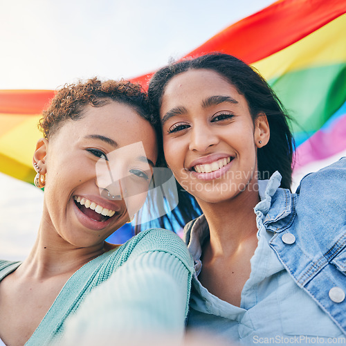 Image of Portrait, couple and lesbian with women in selfie, pride flag and lgbt relationship, happiness outdoor. Female people smile in picture, gen z youth and gay equality, support and trust with partner