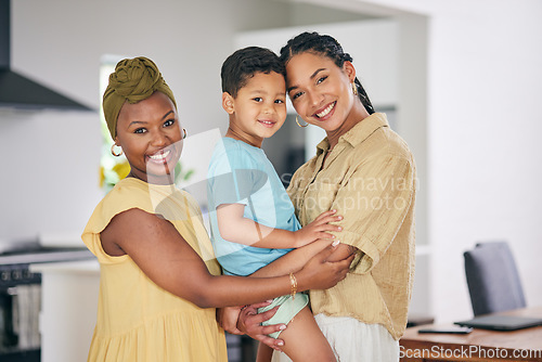 Image of LGBTQ, child or couple hug, portrait and happy queer family, non binary partner or transgender mom enjoy time together. Home bond, embrace or gay people, mothers or lesbian women embrace adoption kid