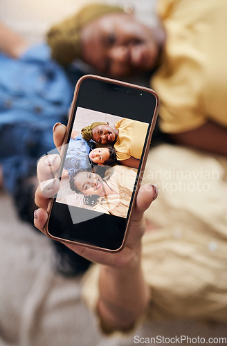 Image of Woman, lesbian couple and child in selfie on floor for social media, photography or online post together at home. Portrait of happy gay women and little boy or kid smile in adoption, photo or picture