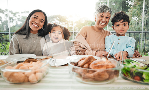 Image of Happy, food and relax with portrait of family in dining room for lunch, smile and holiday celebration Thanksgiving, party and dinner with people at table in home for nutrition, happiness and love