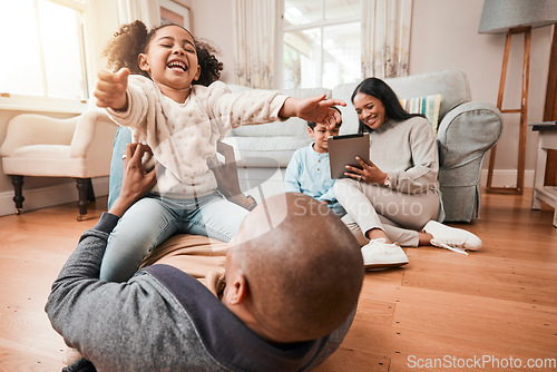 Image of Happy, relax and playing with family on floor of living room for funny, support and freedom. Smile, happiness and youth with father and tickling child at home for care, trust and bonding together