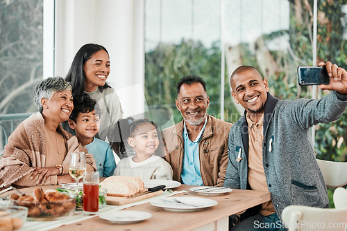 Image of Family, food and smile for selfie at lunch, dinner or celebrate party together at home. Happy generations of kids, parents and grandparents in profile picture, quality time or reunion at dining table