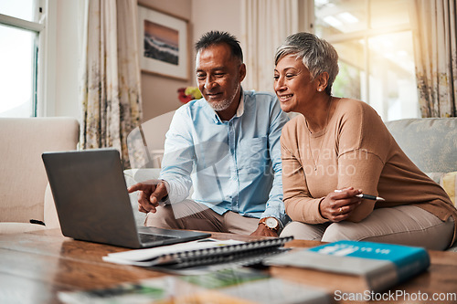 Image of Mature couple, sofa and laptop for planning finance, retirement funding and investment or asset management at home. Elderly people or man and woman reading information on computer for pension savings