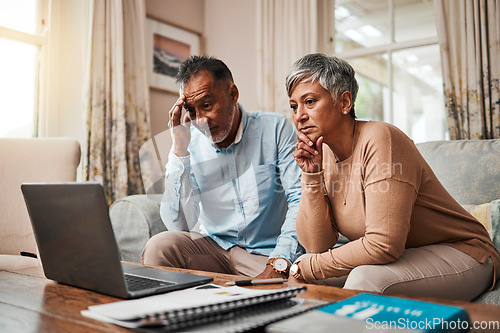 Image of Senior couple, stress and laptop for financial debt, budget mistake and investment fail or asset management at home. Elderly people with depression, thinking or reading news or email on computer