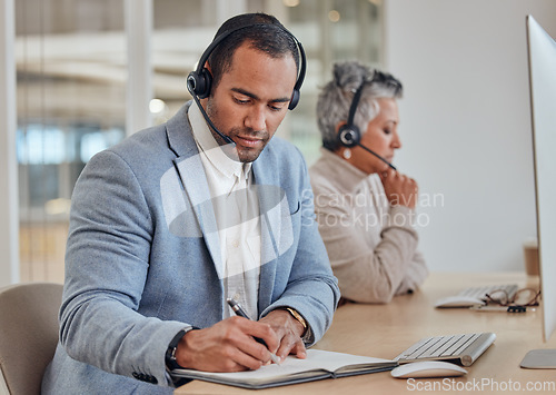 Image of Call center, notebook or man writing in customer service help desk consulting for telemarketing in office. Businessman, notes or consultant planning a schedule or calendar reminder with headset