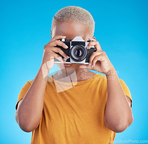 Image of Photographer woman, retro camera and studio for journalist job, art or photoshoot by blue background. African girl, lens and tech for creativity, production or content creation for paparazzi magazine