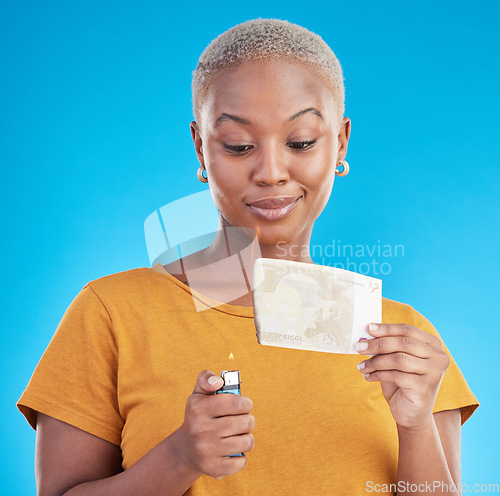 Image of Burning, money and woman with euro bills on fire, flame or college student with debt in financial crisis on blue background. Inflation, increase or African customer spending credit with interest rate