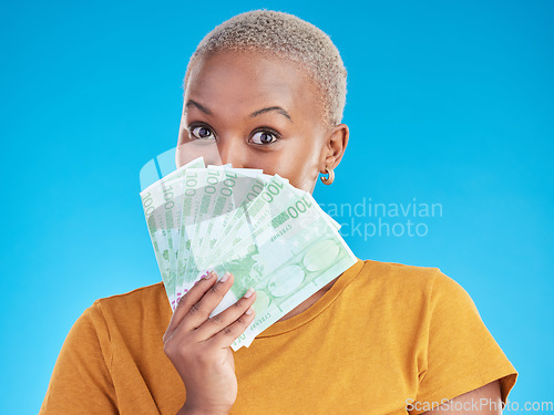 Image of Money, winner and woman cover face on blue, studio background for winning, cash fan or financial loan. Lottery, bank and young african person with bonus, budget secret and finance profit in portrait