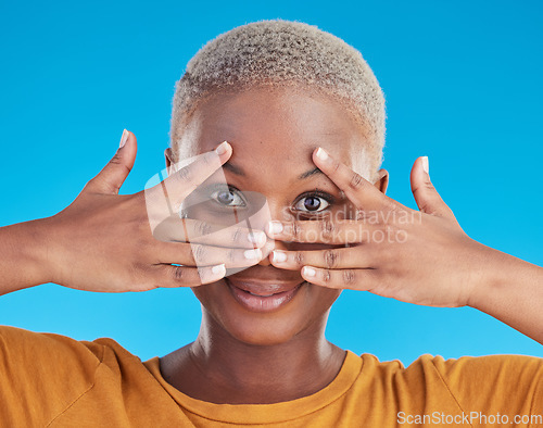 Image of Face, hands and skincare of black woman for beauty in studio isolated on a blue background. Portrait, natural and African model with cosmetics in facial treatment for wellness, aesthetic and health