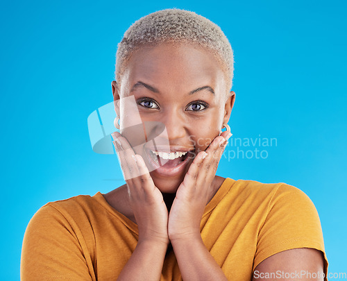 Image of Surprise, portrait and excited black woman in studio for shocking news or deal offer on blue background. Wow reaction, omg and happy female person shocked by gossip, announcement, promotion or deal