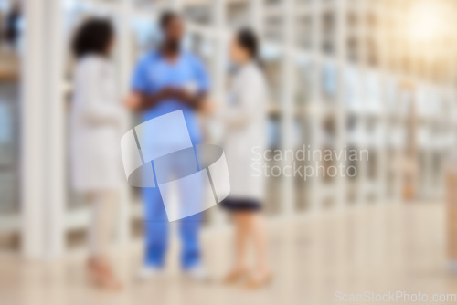 Image of Blurred hospital, doctors and team of nurses consulting for medical services, advice and expert management. Defocused group of healthcare employees meeting for wellness, support or planning in clinic