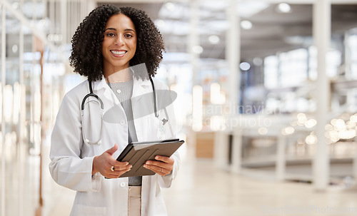 Image of Happy, doctor and portrait of woman with tablet for research, telehealth or healthcare in hospital. Medical professional, face smile and tech of person, expert worker and employee from South Africa