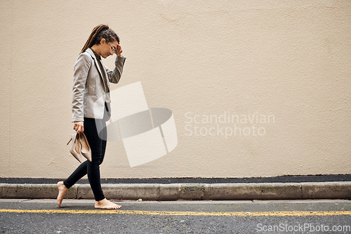 Image of Tired, sad and business woman in city for thinking, fatigue and headache. Burnout, mental health and mistake with female employee walking in street for depression, failure and crisis with wall mockup