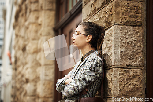 Image of Travel, stress and a tired corporate woman in the city during unemployment or a financial crisis. Mental health, depression or fatigue with an exhausted employee in debt after bankruptcy or a mistake