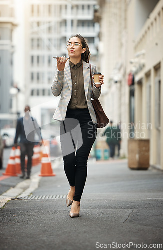 Image of Speaker phone call, city street or business woman walking, consulting or talking with contact, user or person. Cellphone voice app, speech to text and agent chat on morning commute, trip or journey