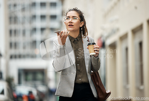 Image of Speaker phone call, city and professional woman walking, speaking and planning in discussion, conversation or communication. Voice note, coffee break and outdoor person chat on morning consultation