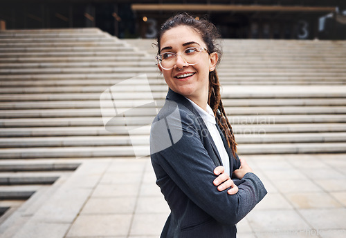 Image of Crossed arms, city and business woman on stairs with happy mindset for morning commute, journey and travel. Professional, happy and female person with smile for career, work and job in urban town