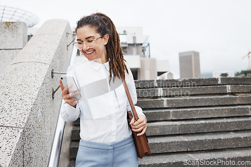 Image of Phone, walking and happy woman texting in a city for travel, chatting or commute outdoor. Smile, social media and female chatting, reading or checking email, app or online communication on town walk