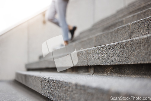 Image of Stairs, legs and city person leaving, walking or on urban journey, urban commute or trip to destination. Outdoor blur concrete cement steps and professional person departure on building staircase