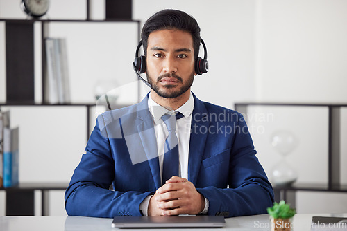Image of Customer service, serious portrait and business man, receptionist or agent for help desk support, telecom or loan advisory. Telemarketing, secretary or corporate person in call center administration