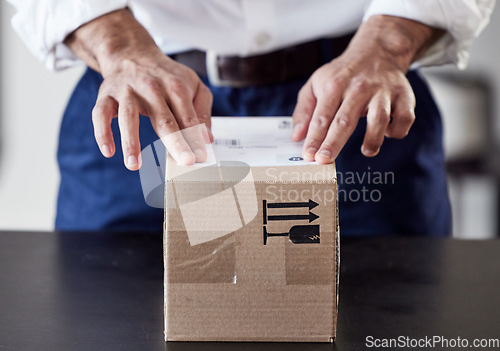Image of Label, delivery or hands of businessman with box for ecommerce, courier cargo or distribution service. Shipping, order sticker or entrepreneur sending a store package, freight parcel or mail product