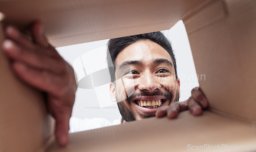 Image of Open, delivery or happy man with box, gift or package with smile for courier service or ecommerce. Face, wow or customer excited by mail post order, parcel cargo or online shopping shipping present