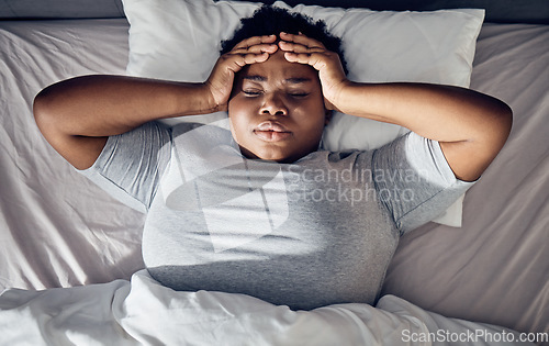 Image of Stress, bed or black woman with headache, insomnia or anxiety from sleeping problem in bedroom. Worry, burnout or tired girl thinking of mistake, loss or depression from emotional grief at home