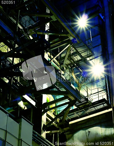 Image of Pipes, tubes, machinery and steam turbine at a power plant