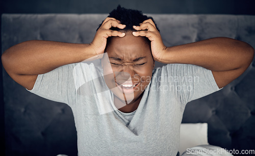 Image of Insomnia, screaming and tired black woman in bedroom at night with anxiety, headache and stress at home. Depression, mental health and female person with pain for problem, anger and morning fatigue