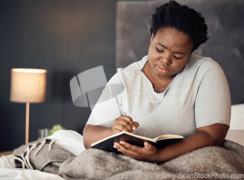 Image of Bedroom, diary and black woman with depression, writing and stress management with sadness, burnout and home. Journal for mental health, female person and girl with a notebook, depressed and anxiety