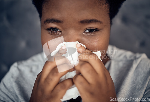 Image of Crying, sad and black woman with depression, tissue and crisis in home. Tears, stress and African person with anxiety from breakup, trauma or grief for death, mental health problem and frustrated