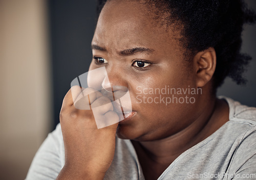 Image of Nervous, scared and black woman with stress, anxiety or trauma from broken heart or divorce at home. Fear, biting nails or face of person worried by loss or disaster of death or frustrated by crisis